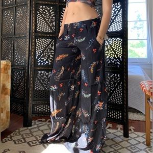FREE PEOPLE one Tropical printed wide leg pants in an easy, lightweight fabric.